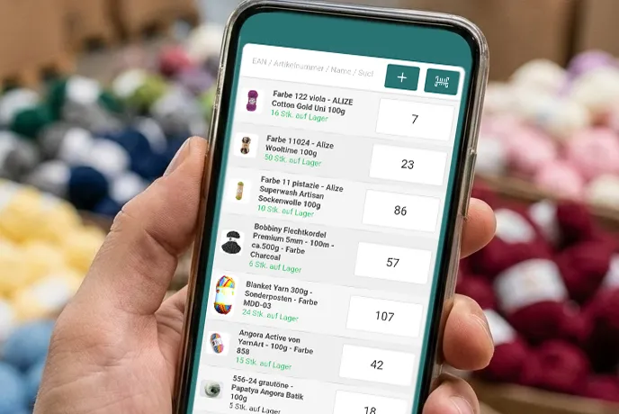 Employee in yarn warehouse holding modern Android tablet scanning product barcode, colorful yarn shelves in background slightly blurred, natural warehouse lighting, 16:11 aspect ratio, photorealistic
